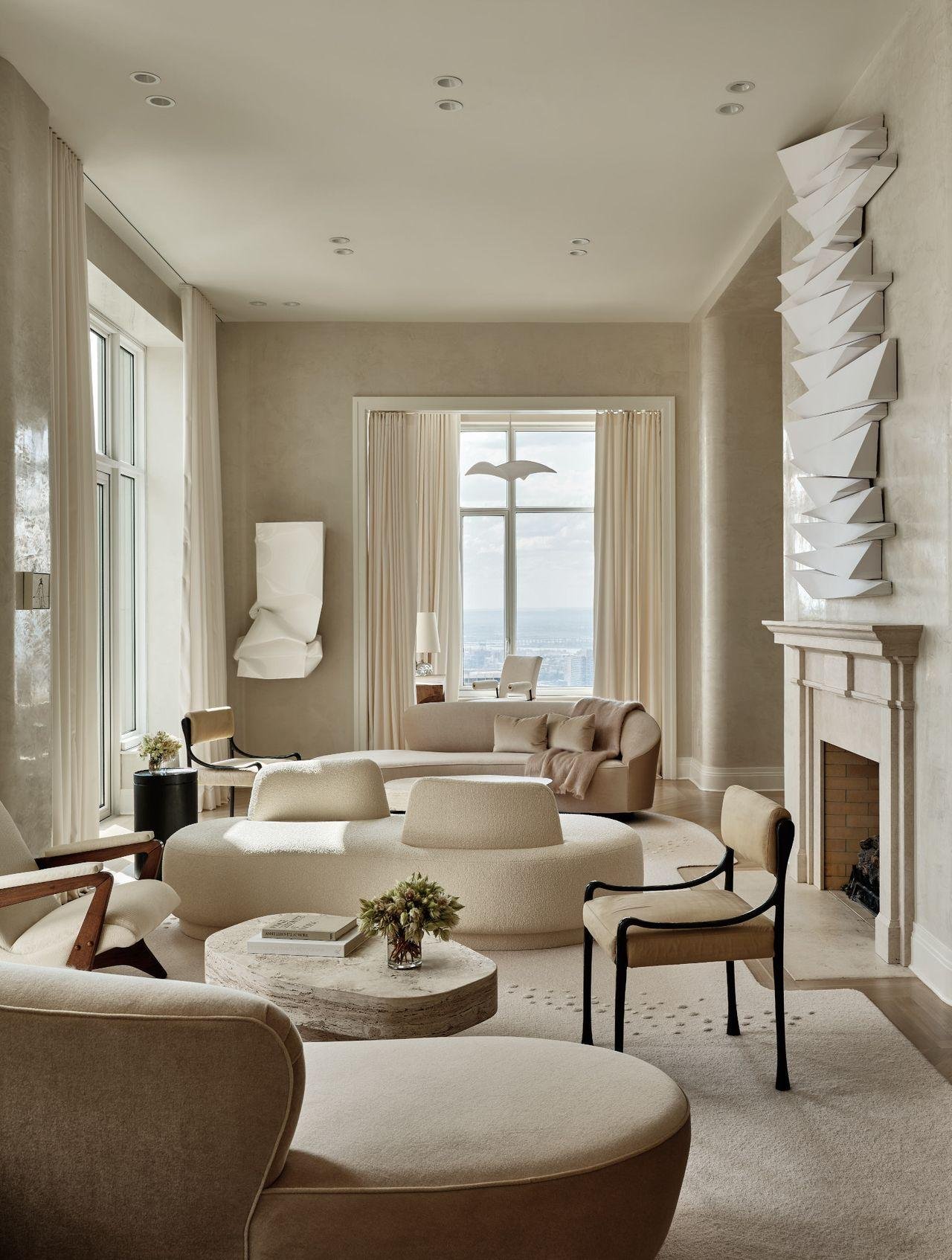 Elegant neutral living room with timeless furniture and warm, natural interior styling